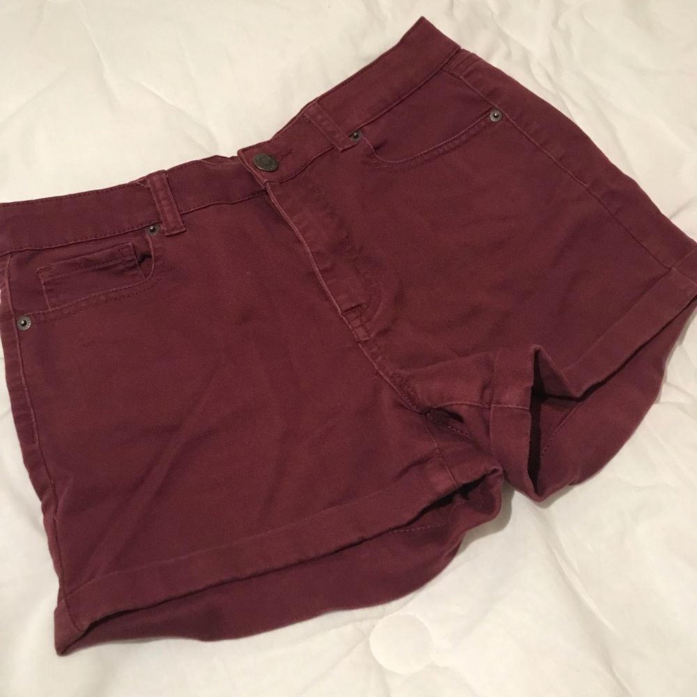 Maroon colored high-waisted shorts